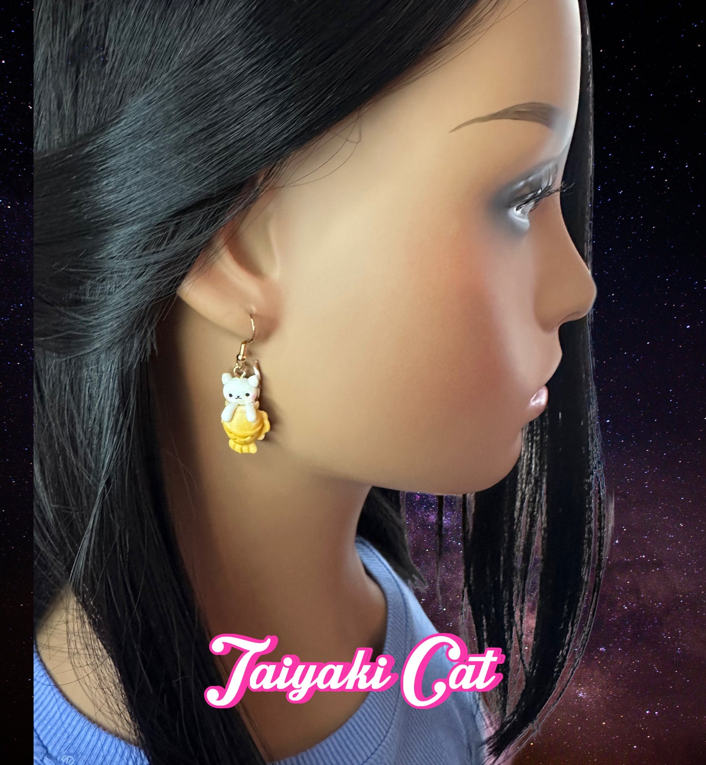 model wearing cute kawaii handmade clay taiyaki cat earrings