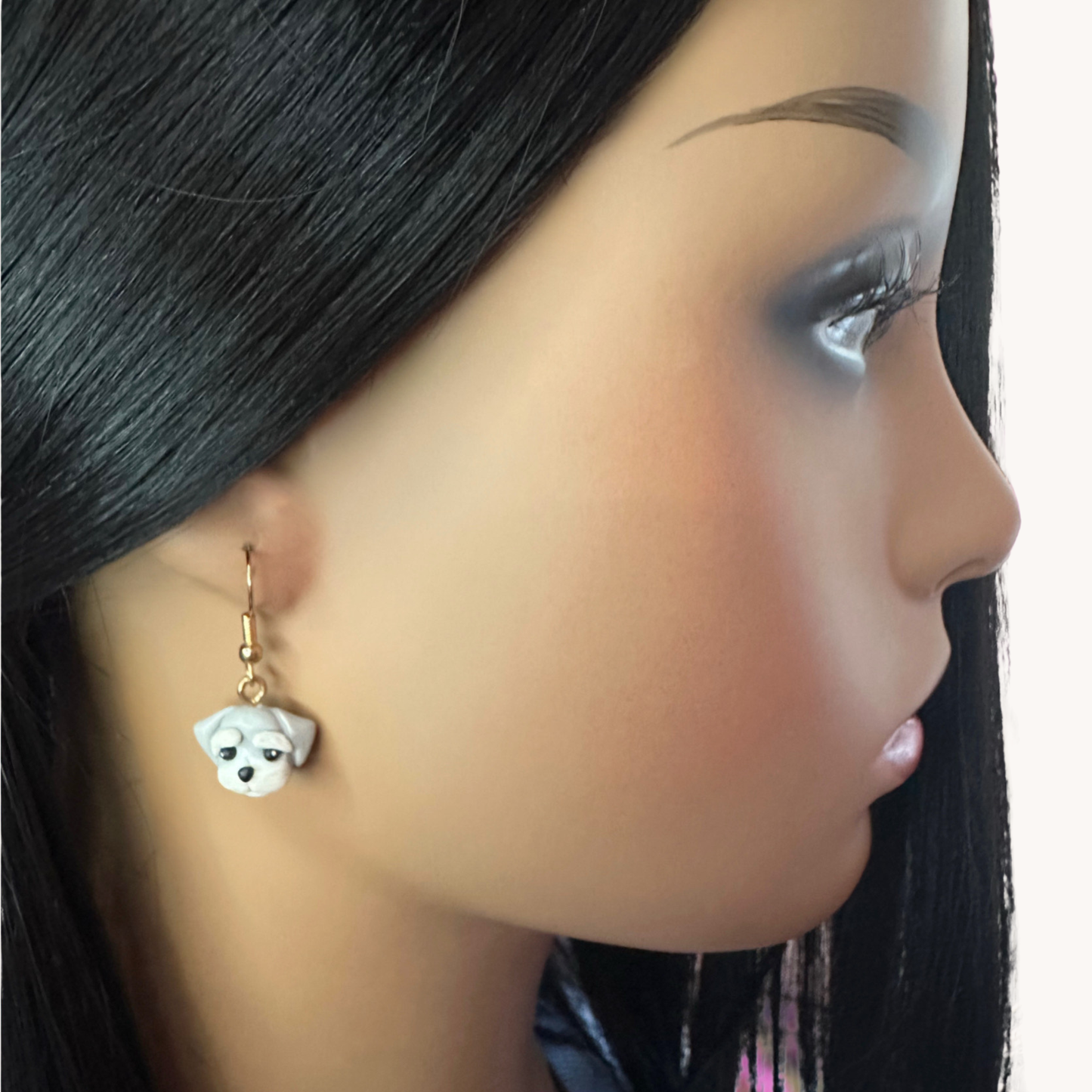 handmade polymer clay schnauzer gold toned fish hook earrings on model