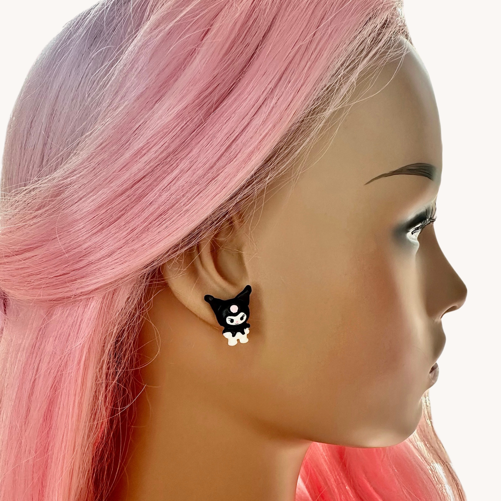 handmade polymer clay kuromi silicon stud earrings on model